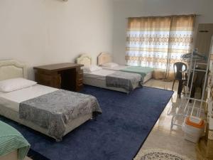 Giường trong phòng chung tại Gisa Hostel All Private Ensuite Rooms