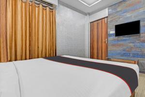 Μια τηλεόραση ή/και κέντρο ψυχαγωγίας στο Collection O Mohan Paradise +20 φωτογραφίες