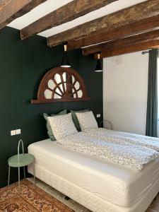 Postel nebo postele na pokoji v ubytování Moulin A
