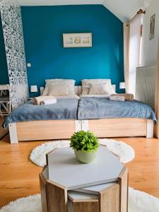 Postel nebo postele na pokoji v ubytování Mini Apartman