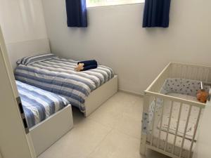 Llit o llits en una habitació de Veralto - Modern Suite with Como Lake view