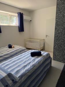 Llit o llits en una habitació de Veralto - Modern Suite with Como Lake view