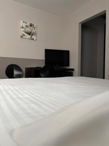TV/Unterhaltungsangebot in der Unterkunft Hotel La Louve