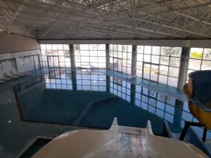 an overhead view of a swimming pool at Aydın palace termal in İhsaniye +12 photos