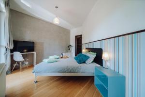 Posteľ alebo postele v izbe v ubytovaní Panorama Gór - Centrum Miasta, Apartament z widokiem na Szrenicę