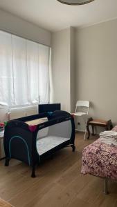 Un pat sau paturi într-o cameră la My Place in Como