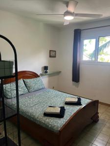 Postel nebo postele na pokoji v ubytování La chambre des canots