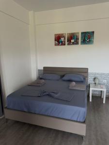 Postel nebo postele na pokoji v ubytování Villa Spartandom