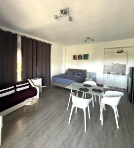 Postel nebo postele na pokoji v ubytování Villa Spartandom
