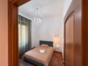 Postel nebo postele na pokoji v ubytování Quadrilocale con terrazza vicino al mare