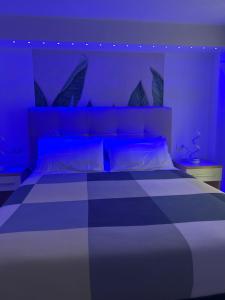 Postel nebo postele na pokoji v ubytování Blumoon boutique