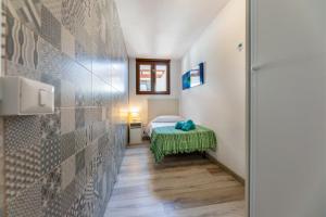 A bed or beds in a room at Casa Esmeralda
