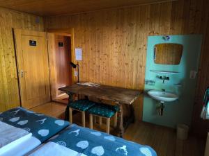 Letto o letti in una camera di Berggasthaus Matu