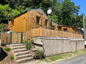 a house that is being built with a fence at La Capiniella in La Chapelle-Moulière