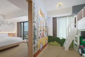 Postel nebo postele na pokoji v ubytování Fairfield by Marriott Bekasi