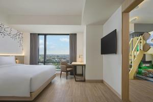 Postel nebo postele na pokoji v ubytování Fairfield by Marriott Bekasi