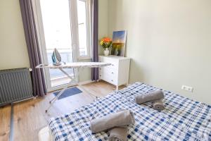 Llit o llits en una habitació de MöwenKoje - Zentral mit PrivatParkplatz