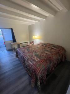 Postel nebo postele na pokoji v ubytování Relax Inn