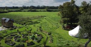 an aerial view of a garden in a field at "la ferme des grands-parents" in Auboncourt-Vauzelles