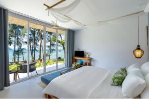 Кровать или кровати в номере Krabi Home Resort