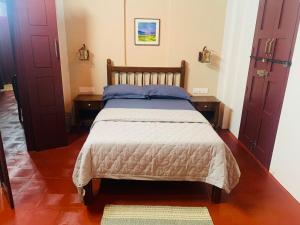 Postel nebo postele na pokoji v ubytování Eden Casa + 19 fotografií