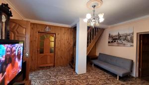 Un televizor și/sau centru de divertisment la Коттеджный городок Динамо Конча-Заспа