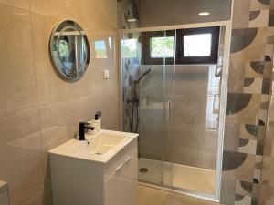 a bathroom with a sink and a shower at All You Need Holiday in Pula +36 photos
