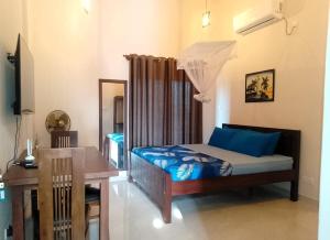 Postel nebo postele na pokoji v ubytování Transit Studio Katunayake + 100 fotografií