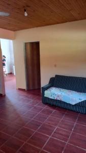 Postel nebo postele na pokoji v ubytování Alugo casa no vale do capao