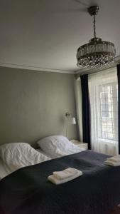 Ένα ή περισσότερα κρεβάτια σε δωμάτιο στο Brunius Guesthouse