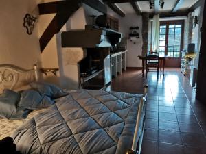 Postel nebo postele na pokoji v ubytování Le Gîte Latour Milieu