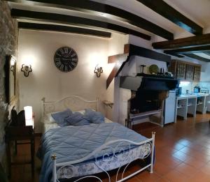 Postel nebo postele na pokoji v ubytování Le Gîte Latour Milieu