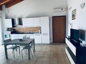 Kuchyň nebo kuchyňský kout v ubytování Casa Caretta