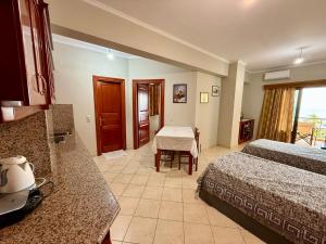 Postel nebo postele na pokoji v ubytování Mitro Guesthouse