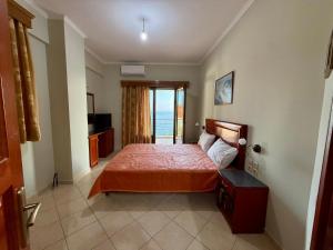 Postel nebo postele na pokoji v ubytování Mitro Guesthouse