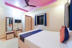 Afbeelding uit fotogalerij van Hotel O Kunal Lodge in Pune +36 foto's