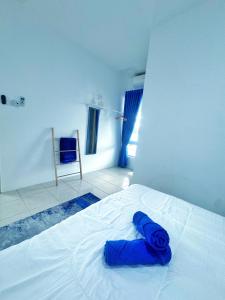 Letto o letti in una camera di Santorini Vibes Penang - Tasek Gelugor
