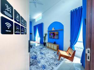 Letto o letti in una camera di Santorini Vibes Penang - Tasek Gelugor