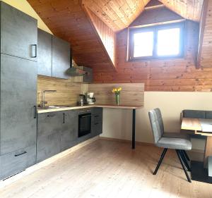 Kuchyň nebo kuchyňský kout v ubytování Appartment Lukasser