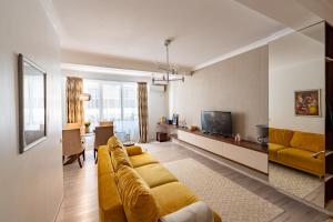 TV a/nebo společenská místnost v ubytování NABARO 44 Harmony Lake View