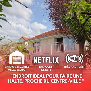 a sign in front of a house at Proche Centre, Gare, Parc, Parking by Maison Bonhage in Chaumont