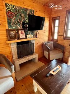 Μια τηλεόραση ή/και κέντρο ψυχαγωγίας στο Chimuelo, es necesario hacer sena para reservar