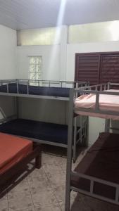 a group of bunk beds in a room at CHÁCARA recanto das nuvens 2 in Arujá
