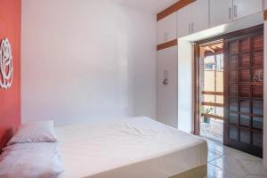 Cama ou camas em um quarto em PARAISO DO ALEXANDRE para 15 hóspedes