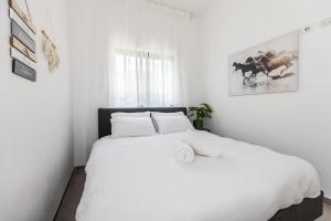 Postel nebo postele na pokoji v ubytování סוויטת מול הבניאס + 20 fotografií