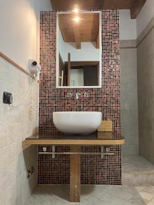 A bathroom at Cozy flat + parking close to City center/Airport