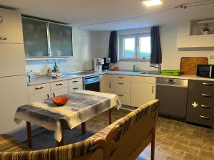 Kuchyň nebo kuchyňský kout v ubytování Apartment Staudacker