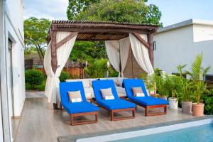 Бассейн в Villa Vintana Nosy Be или поблизости
