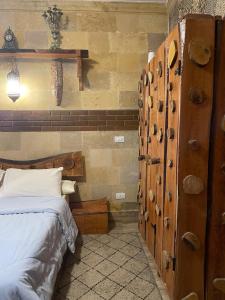 Postel nebo postele na pokoji v ubytování Cozy Furnished Studio with Terrace