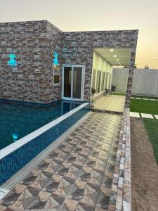 Foto sihtkohas Al Rahba asuva majutusasutuse Luxury Farmhouse Near Yas Island With Swimming Pool, BBQ Area & Majlis galeriist